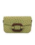 Edera Ostrich Leather Deya bag with wood detail and detachable crossbody strap.