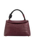 Medium sized crocodile leather handbag in Godiva with rope handle and detachable strap.