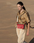 Caia Crossbody in Scarlet Red Ostrich & Flame Red Ostrich Leg Trim